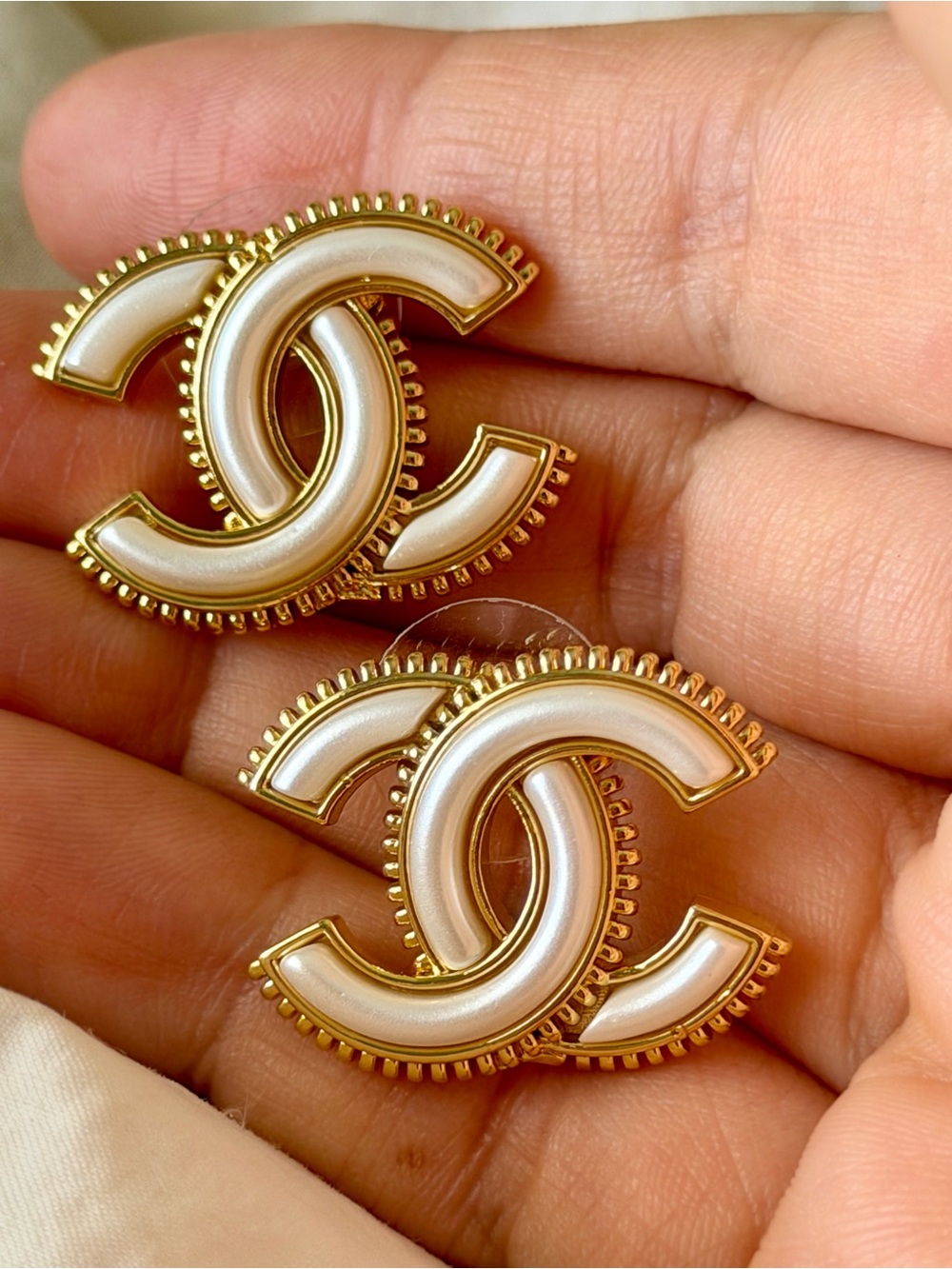 CHANEL Gold and Cream Interlocking CC Earrings